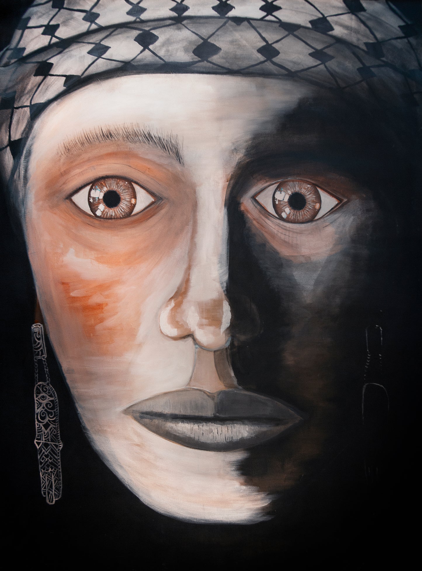 Painting of a face split between light and shadow, wearing a keffiyeh. The eyes are expressive and intense, symbolizing identity and duality.
