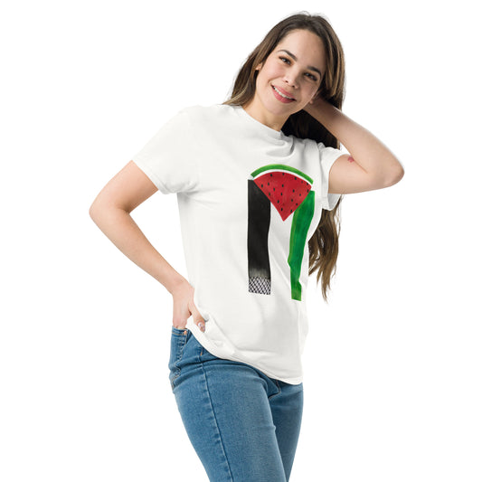 Smiling woman wearing white t-shirt with Muftah Elsheref’s “Free Palestine” artwork featuring a stylized watermelon slice and Palestinian flag design
