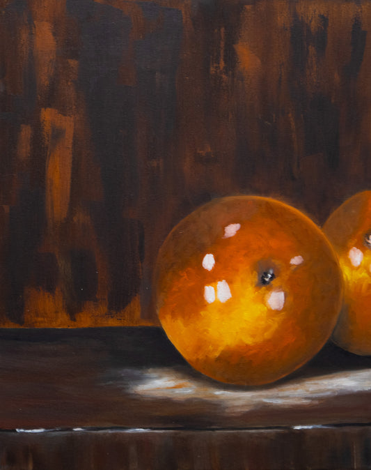 Oil painting of two richly colored oranges resting on a dark wooden surface, symbolizing Palestinian memory and connection to the land.