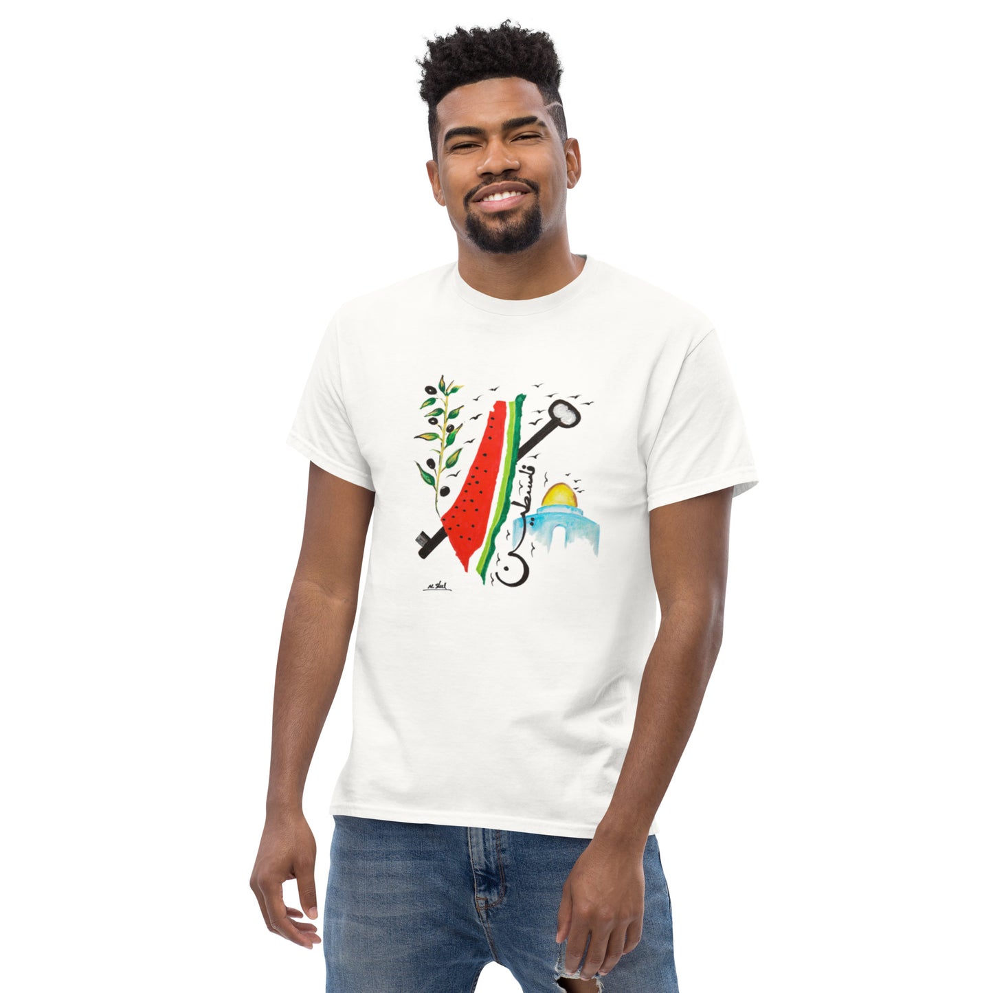 Man wearing white T-shirt featuring "A Slogan for Palestine" by Muftah Elsheref, with a painted watermelon, olive branch, key and Dome of the Rock