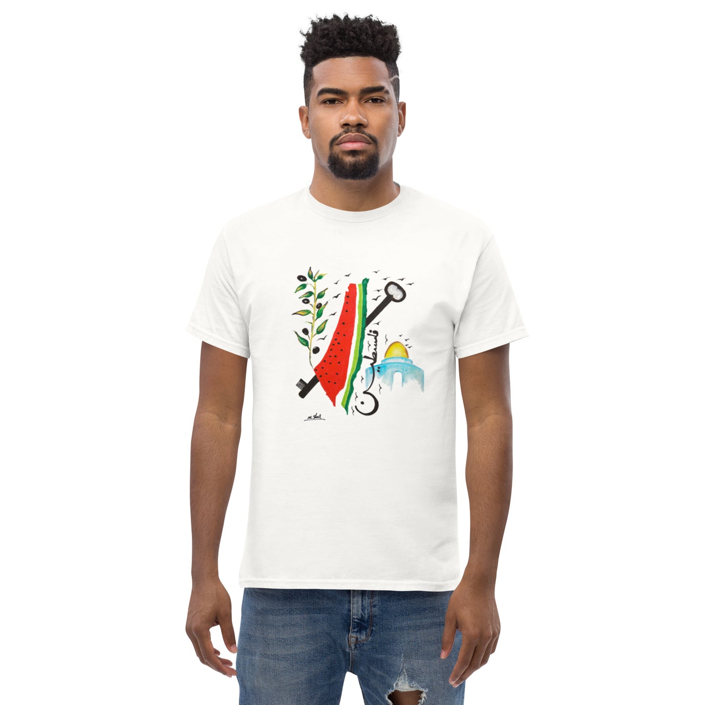 Man wearing white T-shirt featuring "A Slogan for Palestine" by Muftah Elsheref, with a painted watermelon, olive branch, key and Dome of the Rock